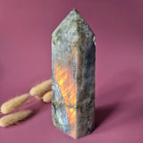 XL Labradorite tower with orange flash; purple-gray stone, polished pointed tip, 500g