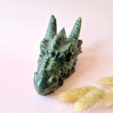 Green jade dragon skull sculpture, XL gemstone carving with detailed scales.