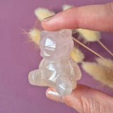 Rose quartz bear crystal carving, 4 cm, pink faceted gemstone.
