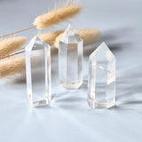 Three clear quartz obelisk towers, 4–6 cm each, by Moonlight Gemstones.