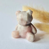 Bear-shaped pink jade crystal carving, 4 cm, faceted