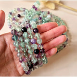 Edelsteen armband Moonlight Gemstones, 8mm fluoriet kralen; groen en paars, multi-strand