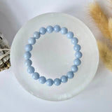 Edelsteenarmband Angeliet, 8mm glanzende lichtblauwe kralen