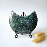 Moss agate crescent moon on stand by Moonlight Gemstones, druzy pattern in green-blue hues