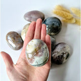 Moonlight Gemstones Ocean Jasper palmstones, 6–8 cm, multicolored polished worrystone set of 6 held in hand